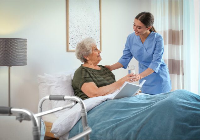 Elderly woman receiving care in hospital room