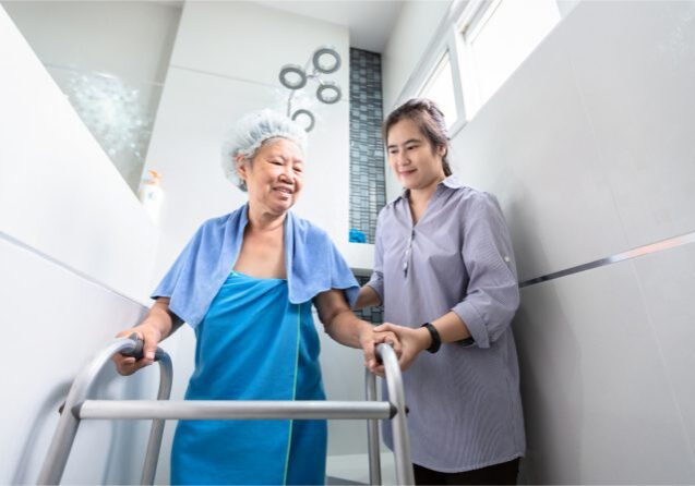 Elderly care in modern bathroom setting